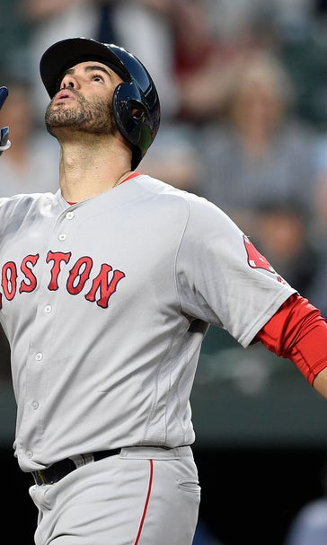 Martinez hits 2 of Boston's 6 HRs in 13-2 rout of Orioles